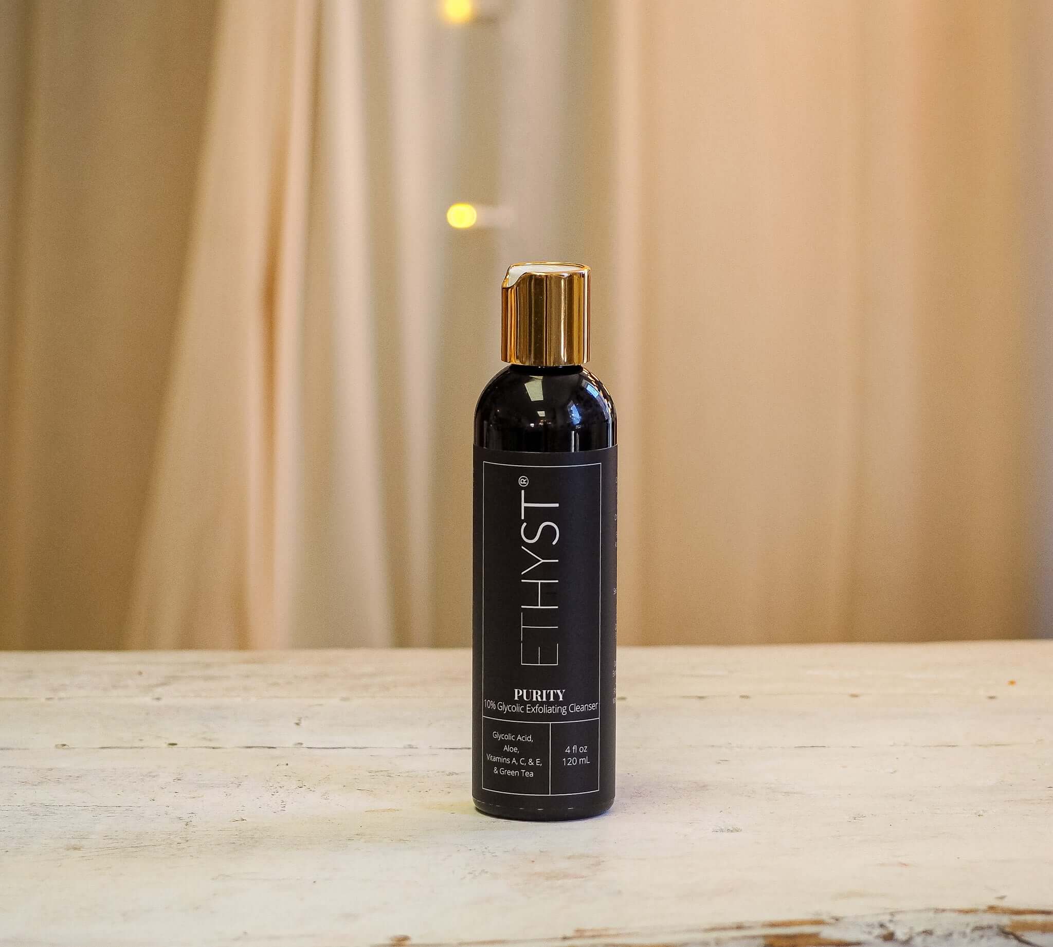 NEW ETHYST® Purity 10% Glycolic Exfoliating Cleanser deeply exfoliates, improves skin freshness, and enhances complexion! Containing 10% Glycolic Acid and Grapefruit Peel oil, this gel cleanser deep cleans without stripping natural oils from the skin while Vitamin A stimulates regeneration and Phospholipids and Sunflower Seed oils lock in moisture.